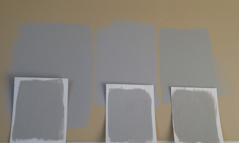 The samples on the wall look blue. The samples on the white boards are the true colors: grey! Sampling on clean, white board will show you the true appearance of your paint choice. 